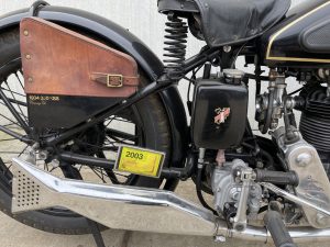 the engine of a black 013 velocette kss350 08 motorcycle